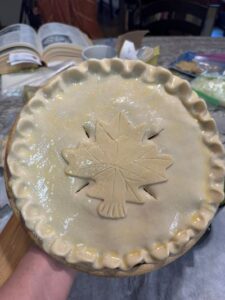 Pie top decorated with Maple leaf cookie cutter shaped